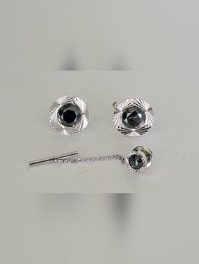 Senator cufflinks and a tie clip